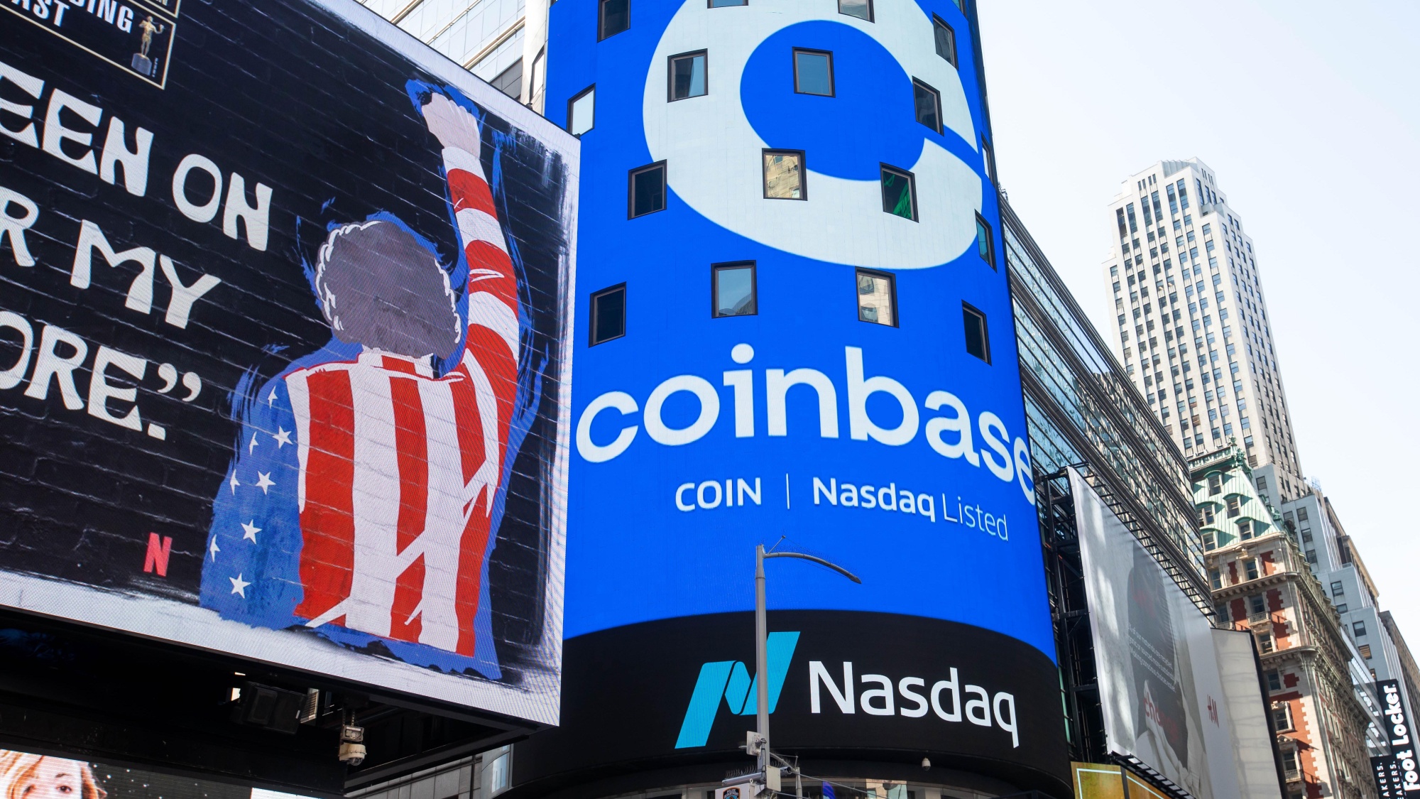 Coinbase stock debuts on Nasdaq in direct listing