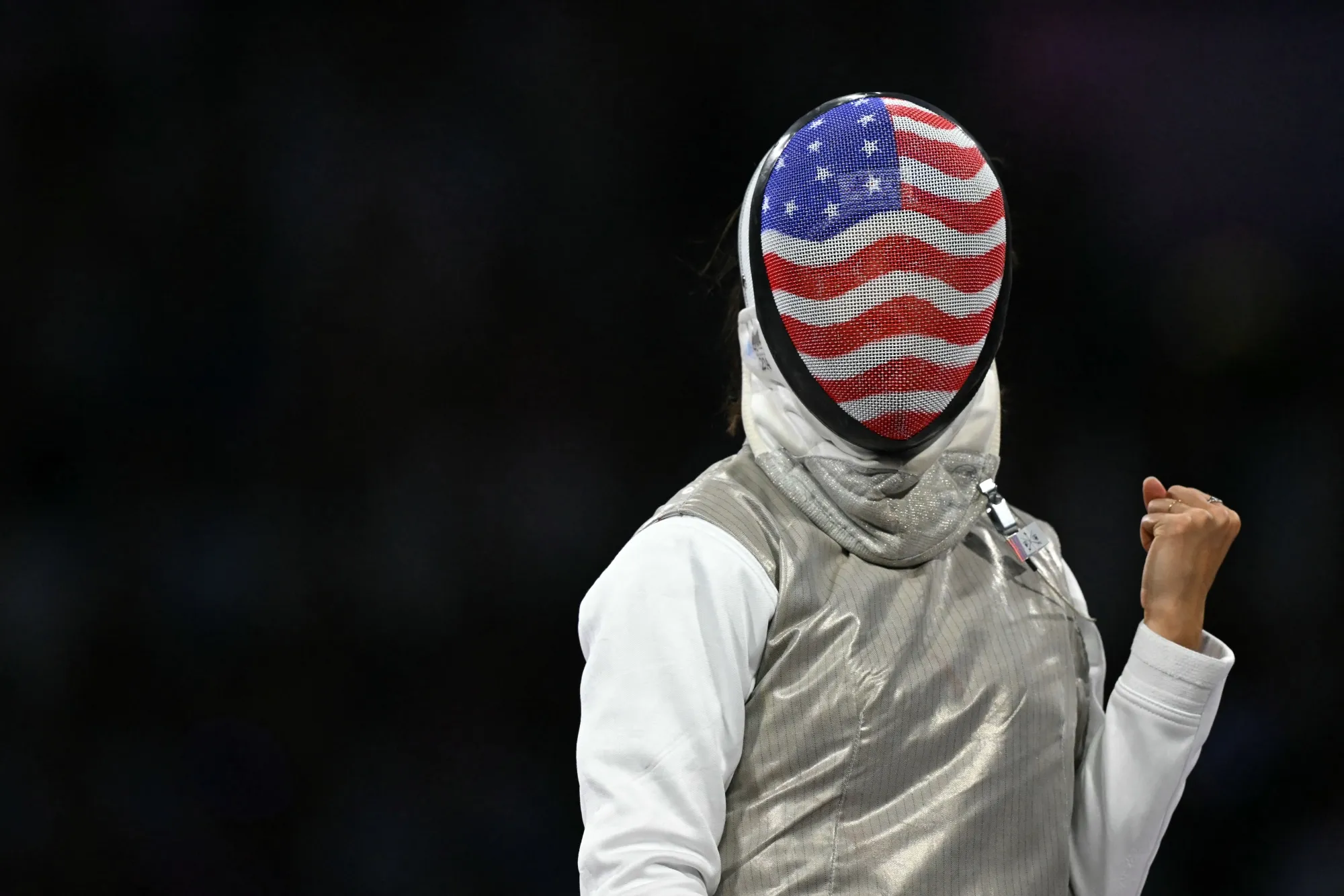 Lee Kiefer reacts as she competes in the women's foil team gold medal bout against Italy during the Paris 2024 Olympic Games at the Grand Palais on Aug. 1.