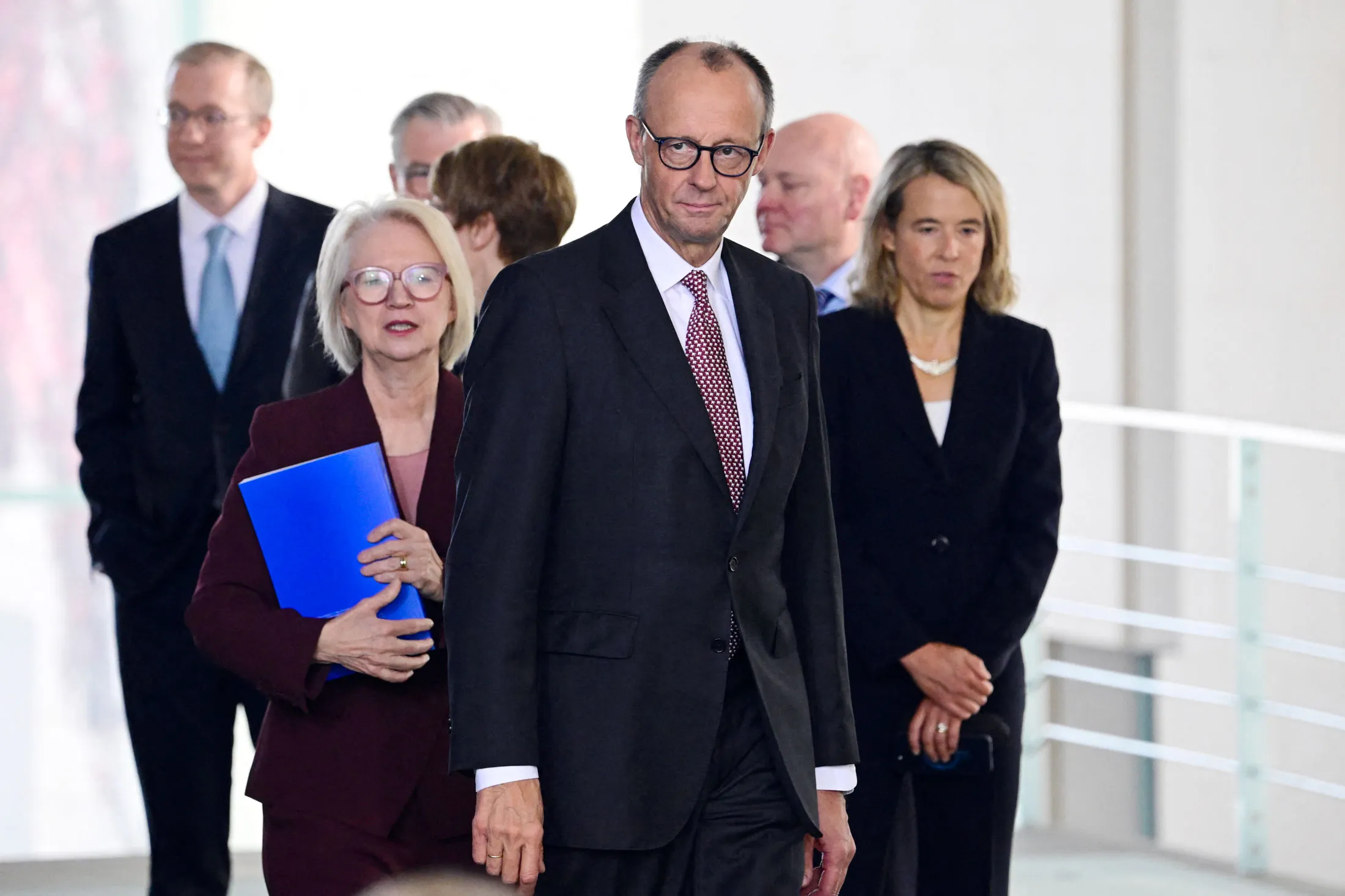 Friedrich Merz with Monika Schnitzer, left, in Berlin, on Nov. 12.