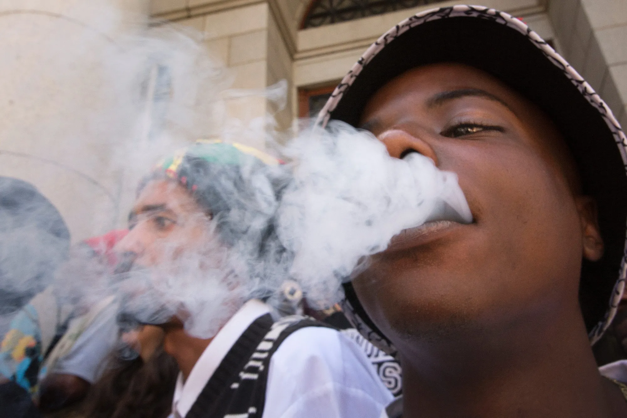 A man smokes in South Africa.