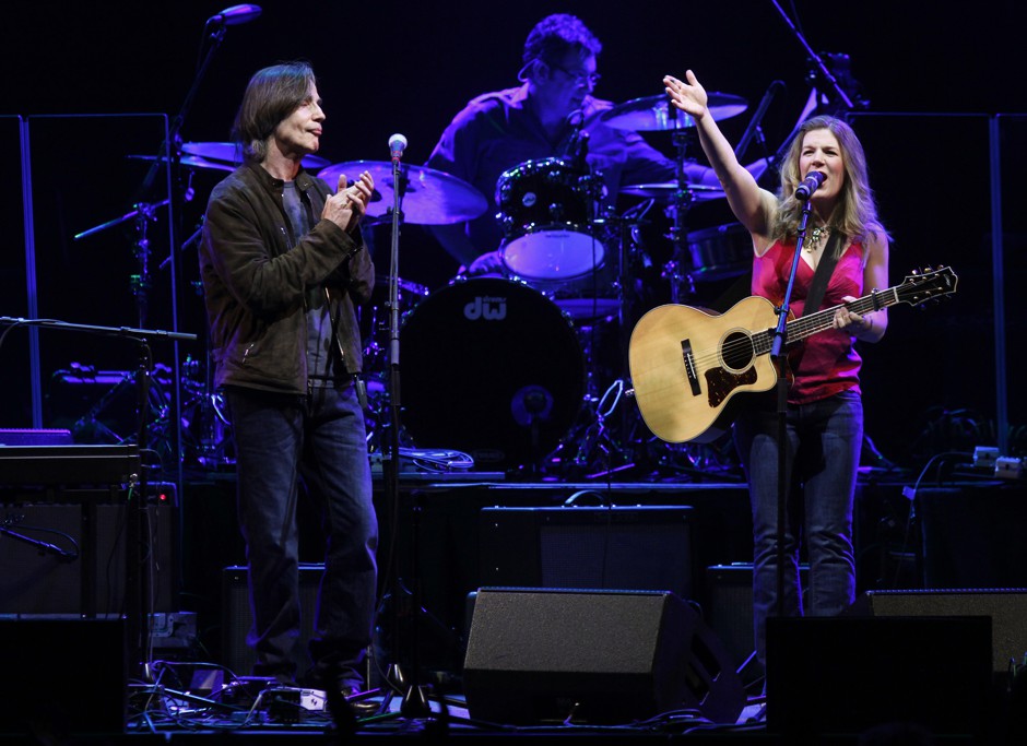Dar Williams performs with Jackson Browne at a benefit concert in Tucson, Arizona, in 2011.