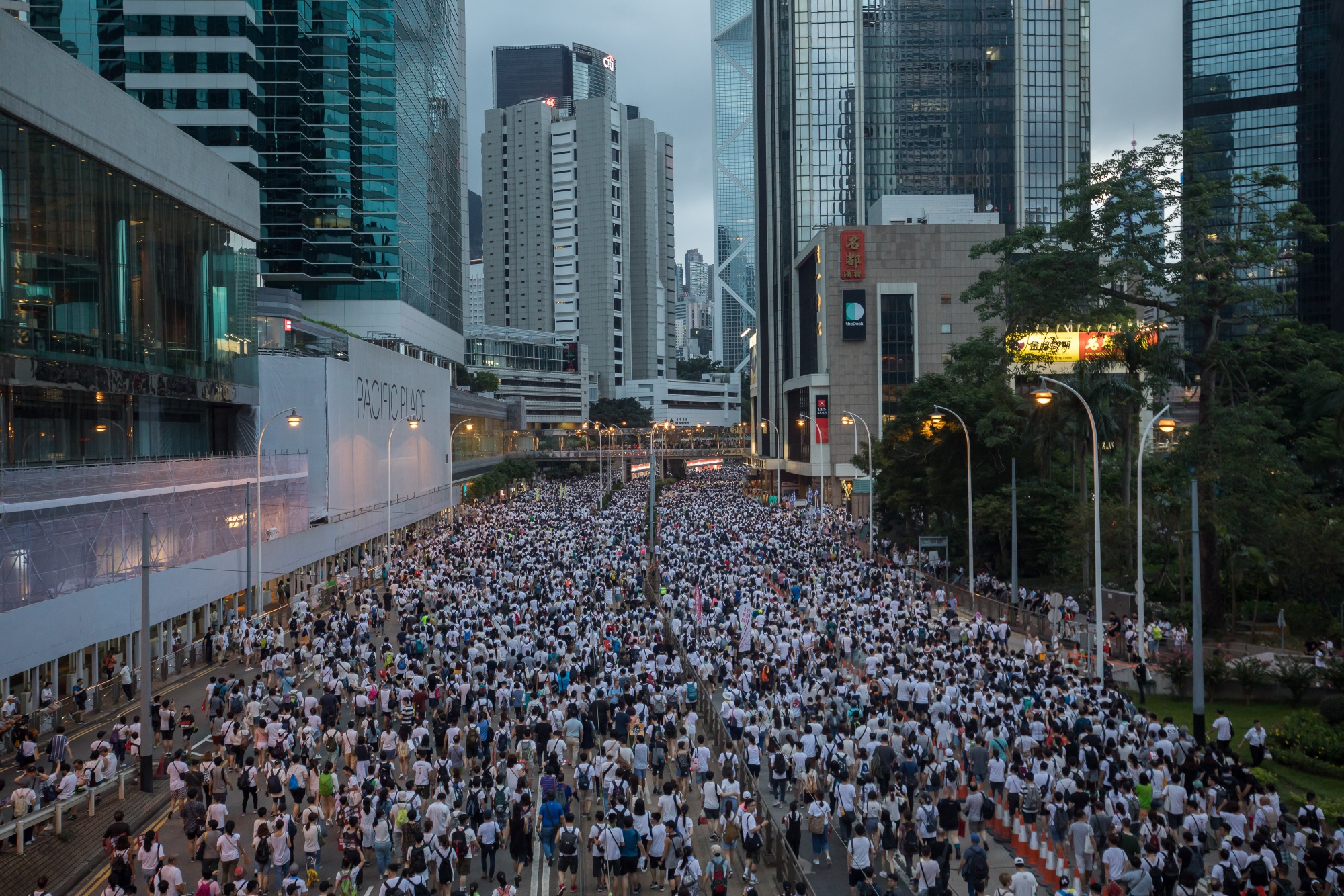 Demonstrators march during a protest against a proposed extradition law in Hong Kong on June 9.