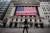 The Fearless Girl statue stands across from the New York Stock Exchange (NYSE) in New York, U.S., on Monday, March 30, 2020. 