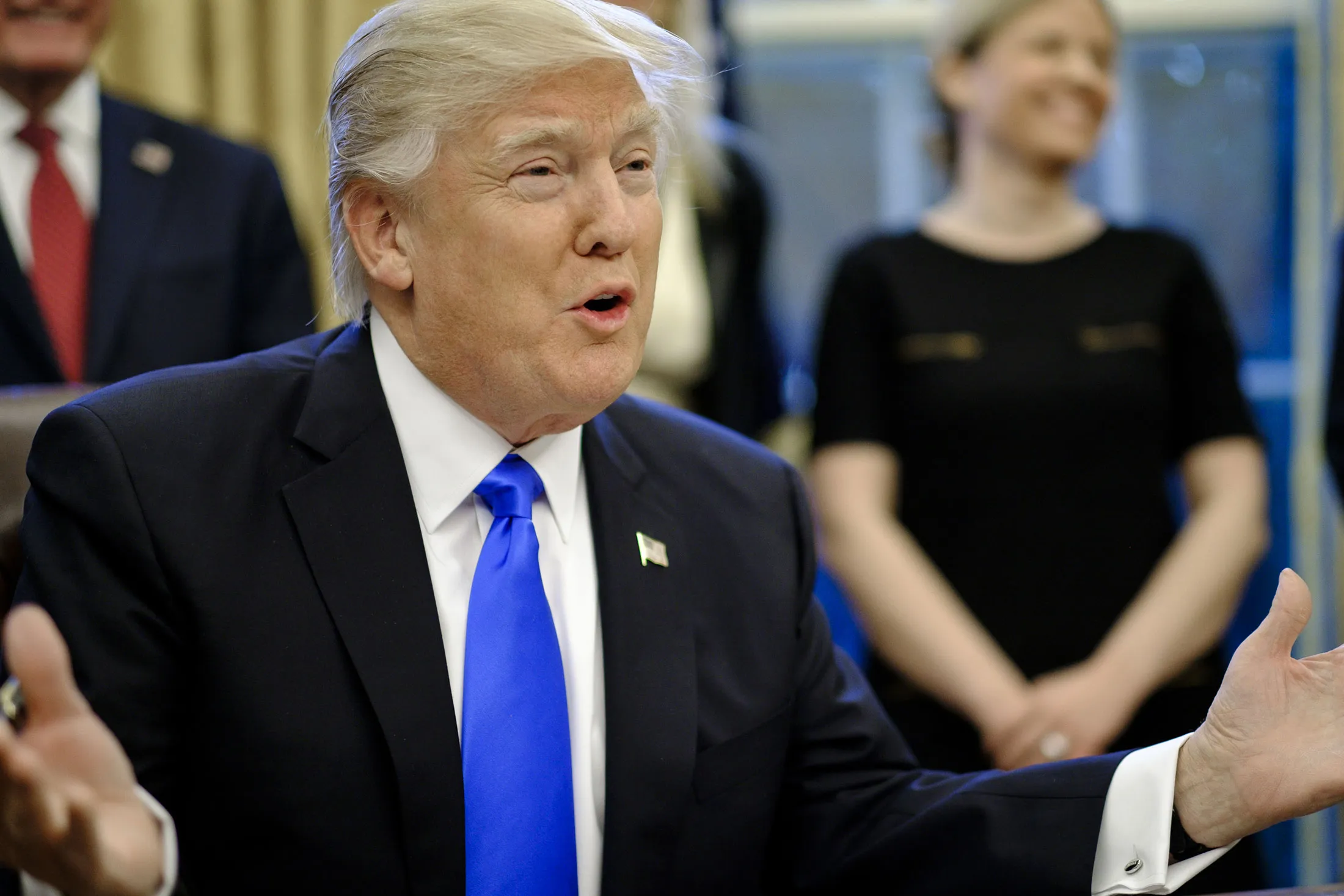President Donald Trump speaks after signing executive orders related to a lobbying ban in the Oval Office of the White House in Washington on Jan. 28, 2017.
