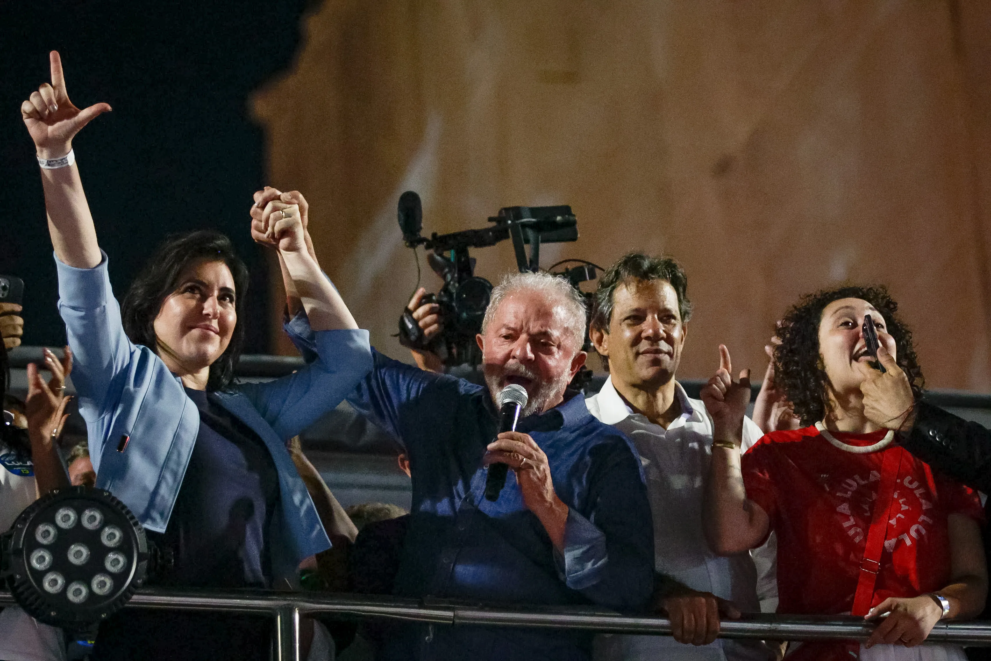 Luiz Inacio Lula da Silva, Brazil's president-elect, center, speaks to supporters on Paulista Avenue in Sao Paulo, Brazil, on Sunday, Oct. 30, 2022.&nbsp;
