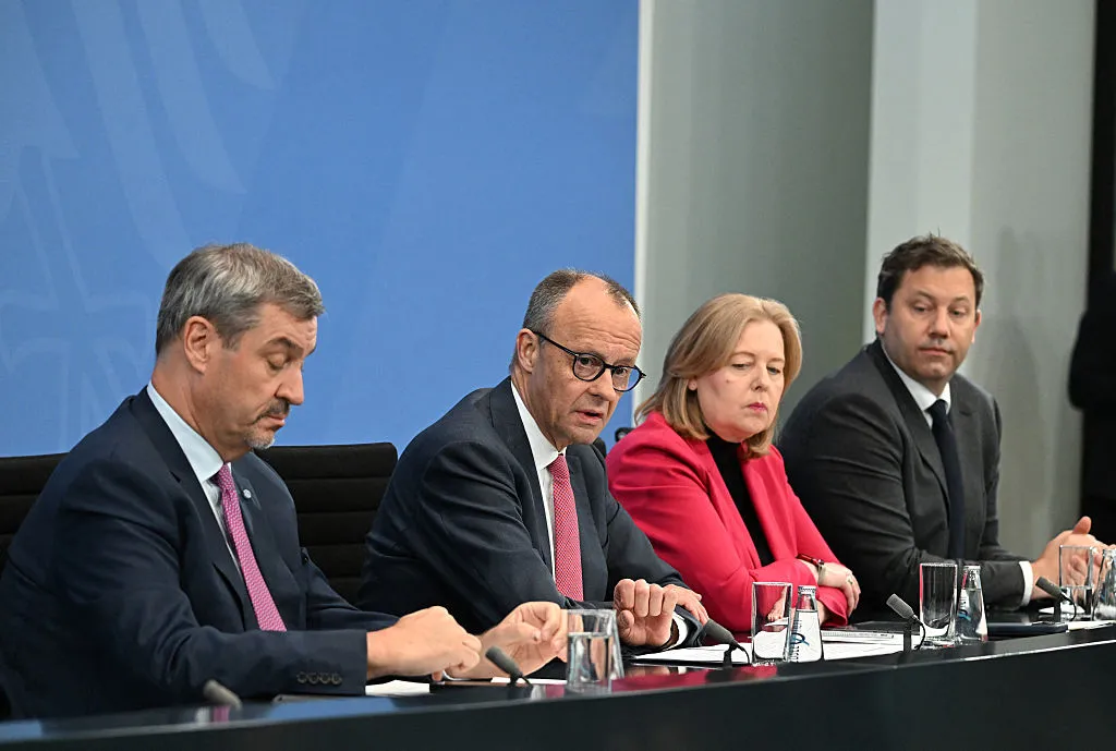 Markus Soeder, Friedrich Merz, Baerbel Bas and Lars Klingbeil during a news conference in Berlin, on April 13.