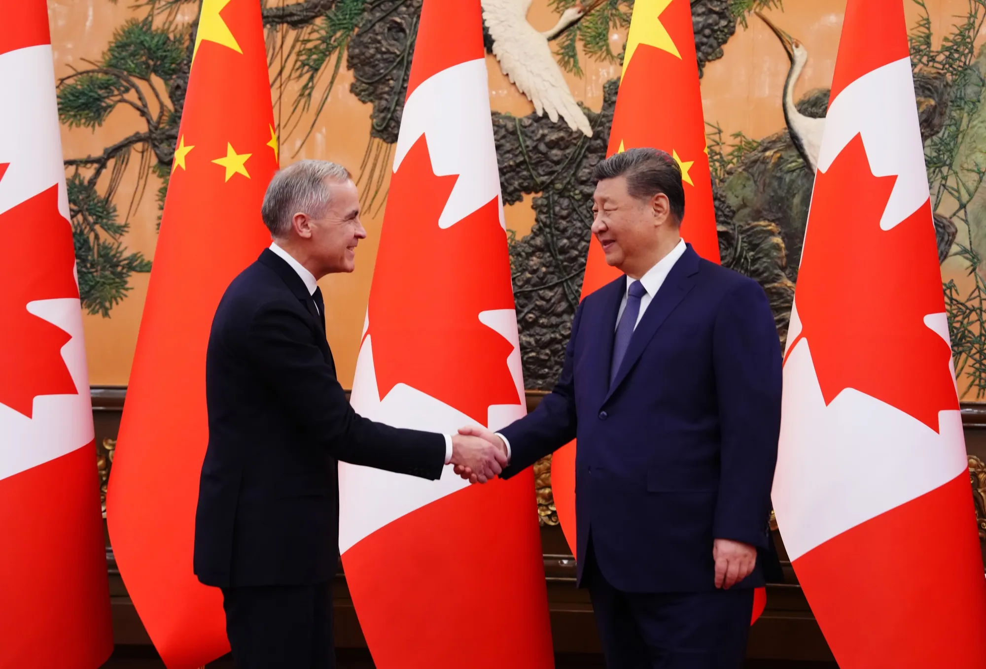Canadian Prime Minister Mark Carney shakes hands with Chinese President Xi Jinping in January.