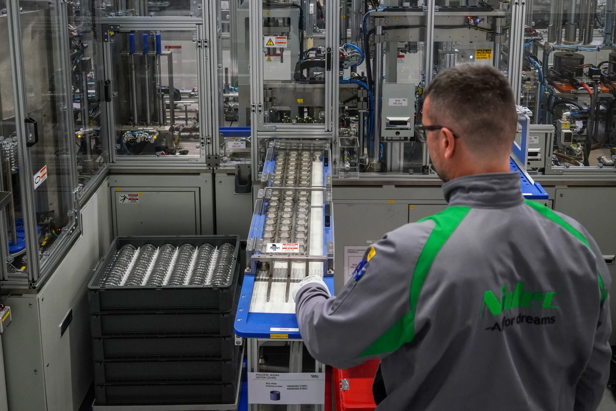 An employee on the automobile electrical servo motor production line at the Nidec Electric Motor Serbia d.o.o. plant in Novi Sad, Serbia.