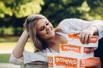 In a stunt that's gone viral, Elyse Chelsea Clark organized a fake engagement photoshoot to proclaim her love for Popeyes. 