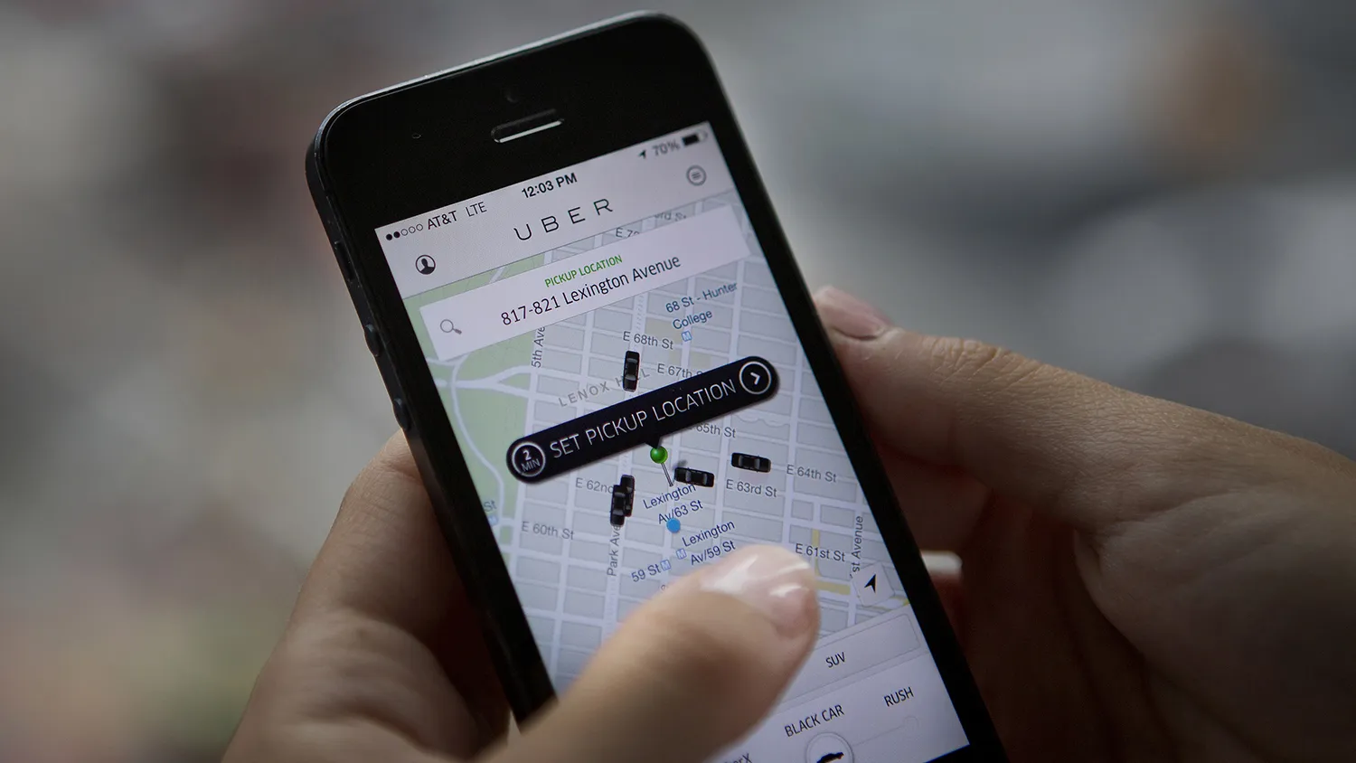 The Uber app is demonstrated in New York on Aug. 6, 2014.
