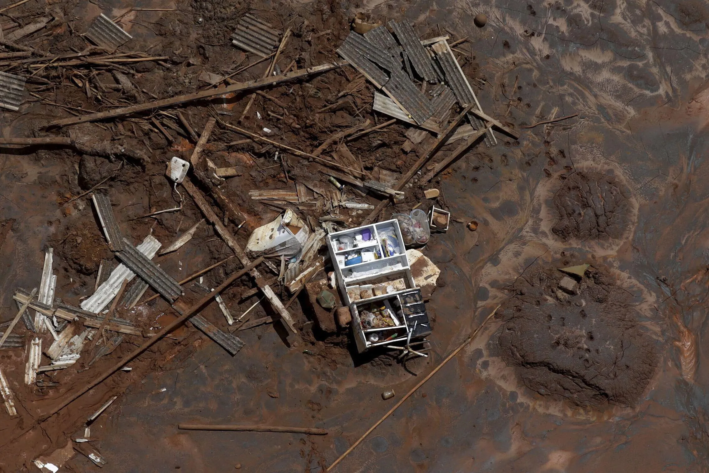 Mud-covered debris in Brazil after the Samarco mine collapse in 2015.