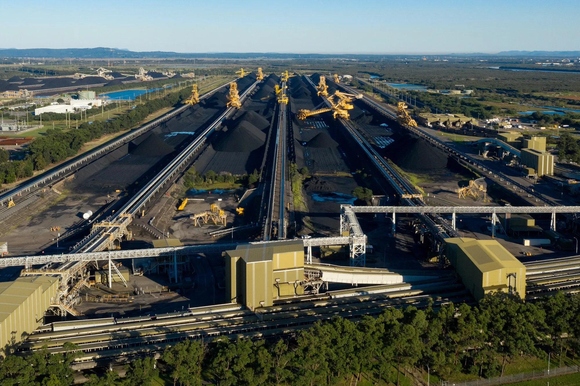Stockpiles of coal at the Newcastle Coal Terminal in Newcastle, New South Wales, Australia, March 26.
