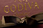 Godiva chocolates sit on display inside a Godiva Boutique