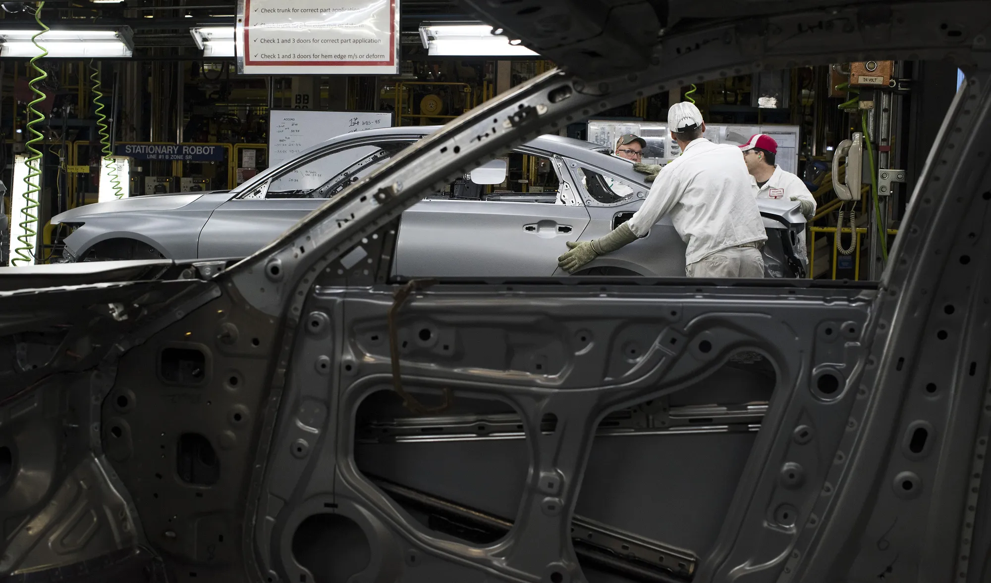 Employees inspect&nbsp;Honda vehicles during production&nbsp;in Marysville, Ohio.