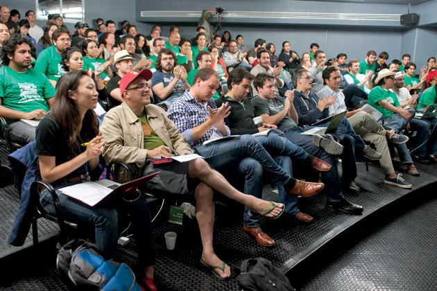 McClure (wearing red cap) reviews potential investments at a Mexico City session of Geeks on a Plane
