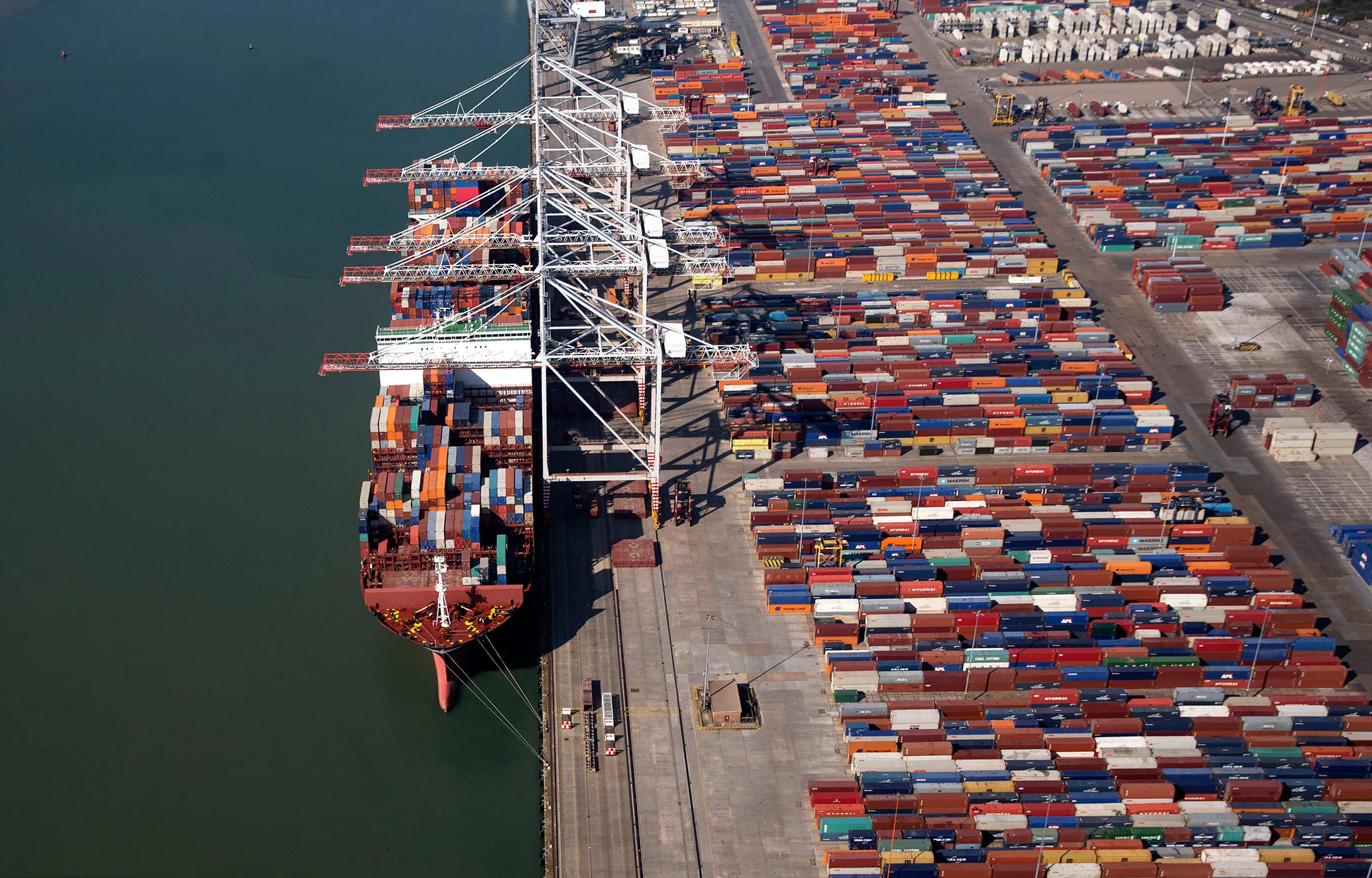 A container ship sits moored during cargo loading operations at the container terminal in Southampton.
