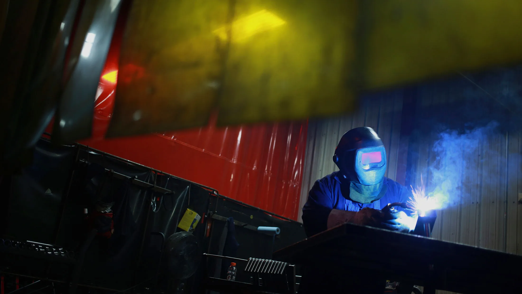 A welder in Falmouth, Kentucky
