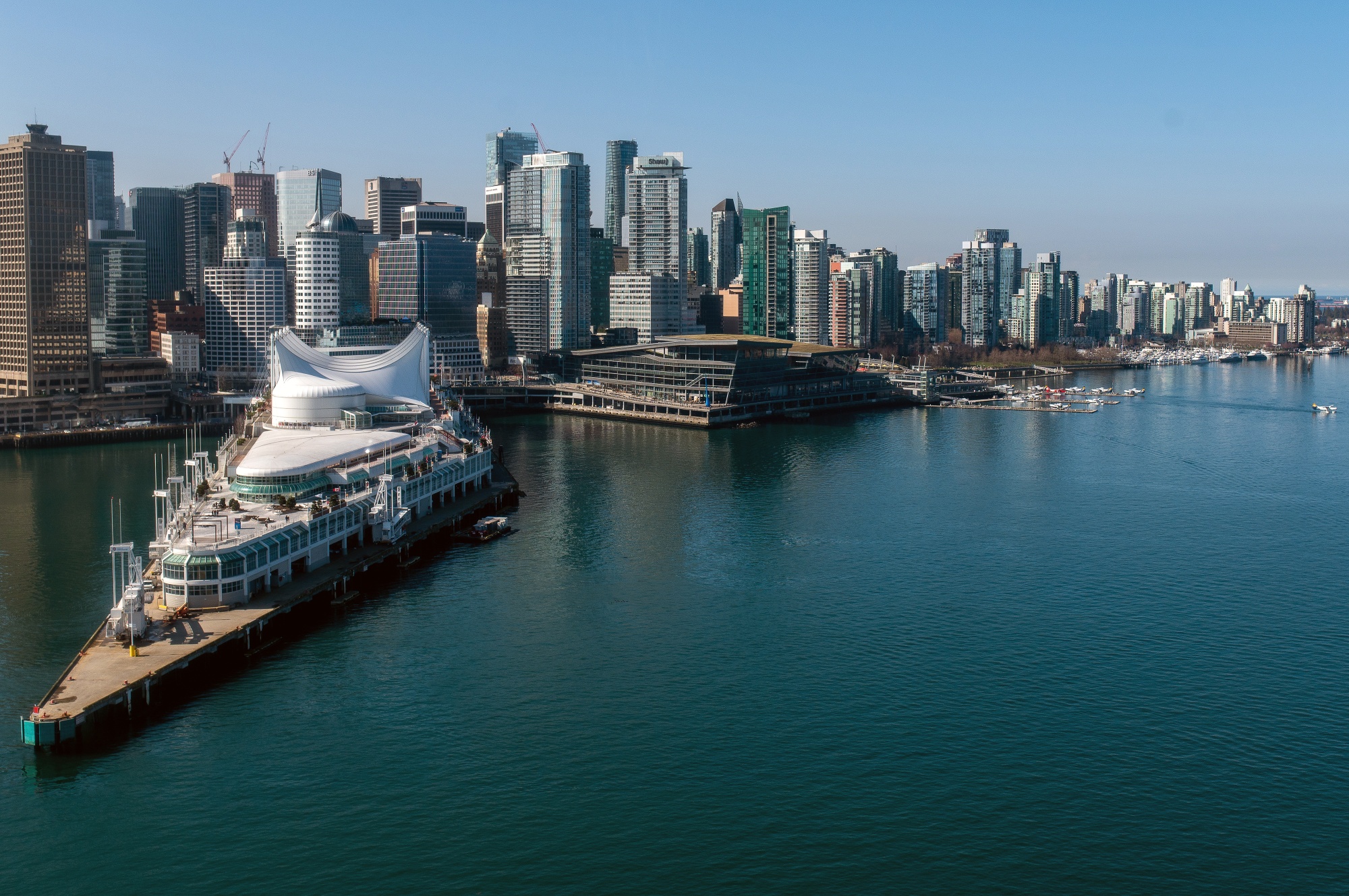 The Vancouver skyline and cruise ship terminal, left, in Vancouver, British Columbia, Canada, on Wednesday, March 22, 2023. Canada is scheduled to release gross domestic product (GDP) figures on March 31. Photographer: James MacDonald/Bloomberg