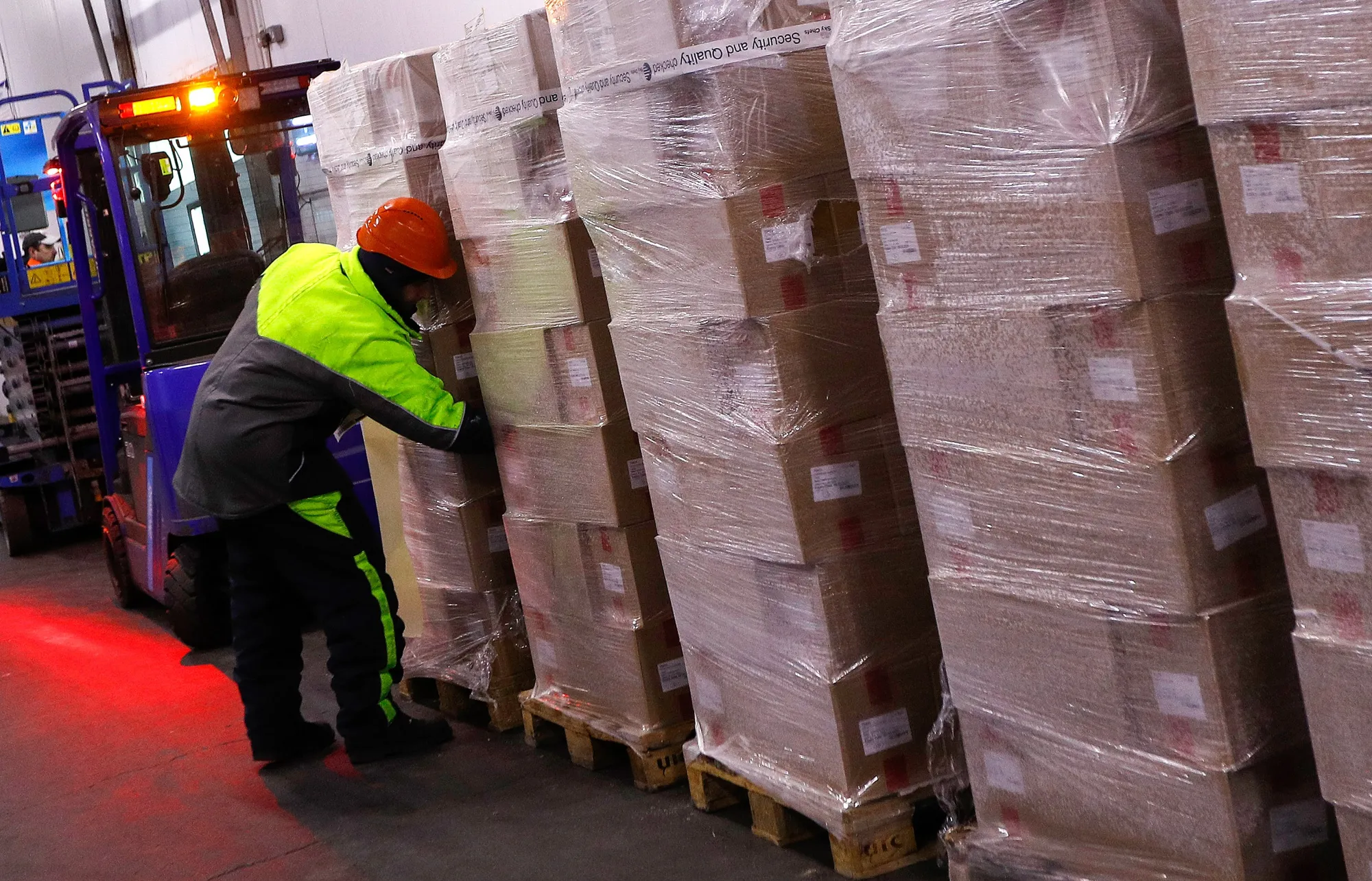 A worker prepares pallets of food&nbsp;at a refrigerated warehouse&nbsp;in Peterborough, U.K.