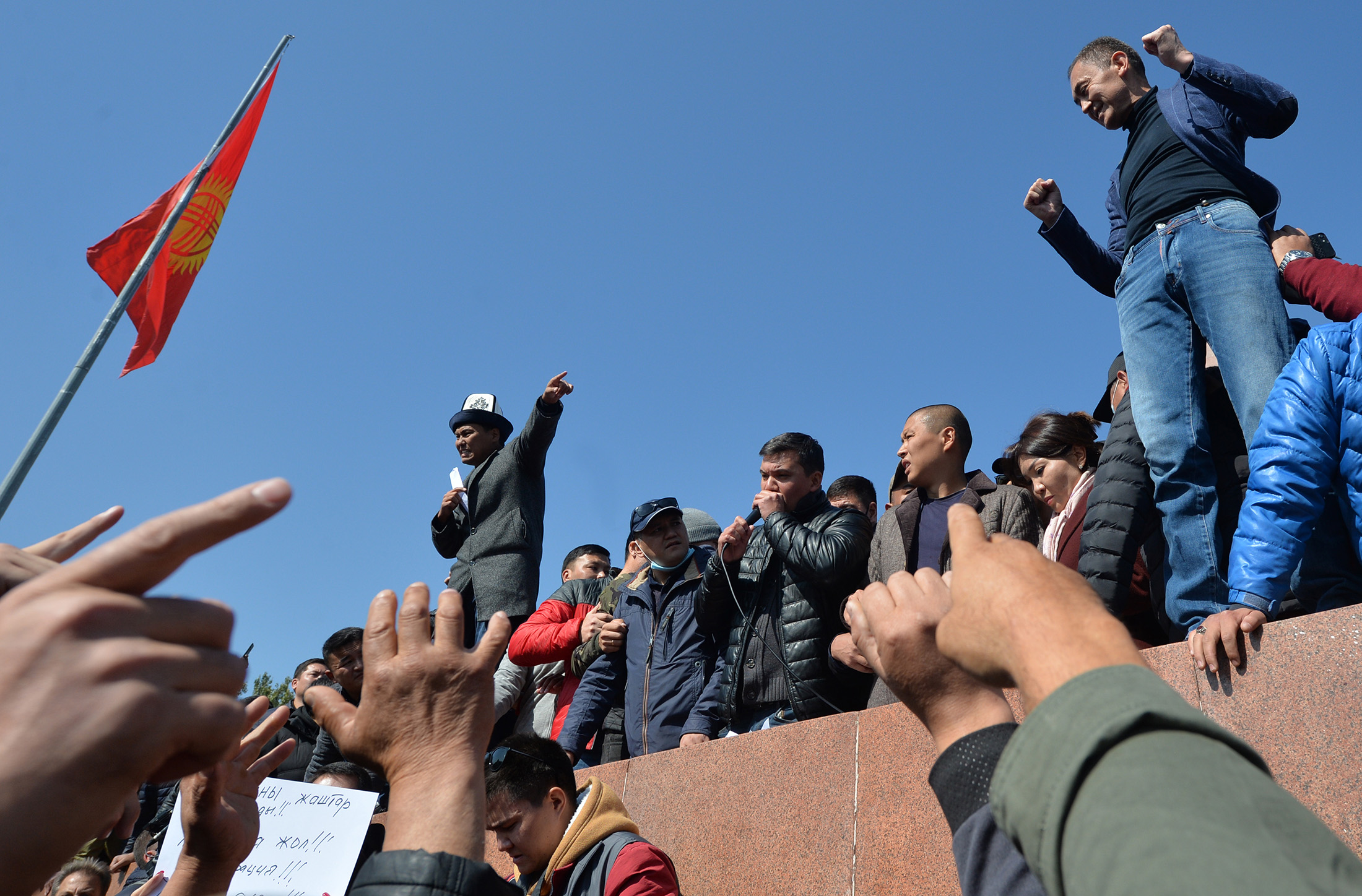 People rally to demand the impeachment of Kyrgyz President Sooronbay Jeenbekov at Bishkek's Ala-Too square on Oct.&nbsp;7.
