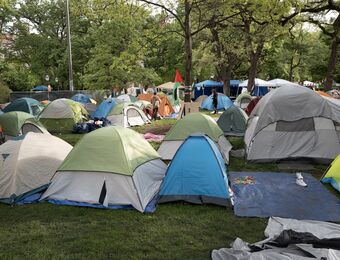 relates to MIT Suspensions in Process; Police Clear Chicago Encampment