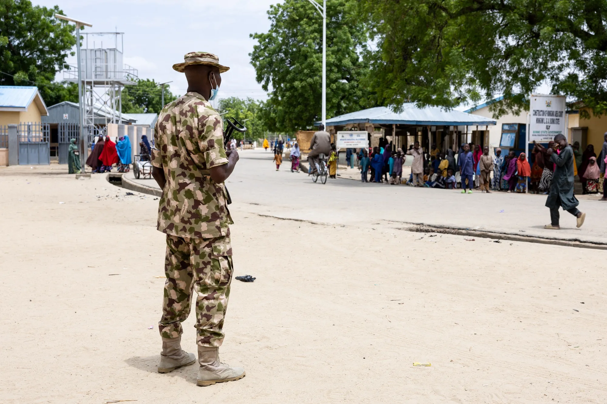 A Nigerian soldier from the Multinational Joint Task Force stands guard in Monguno, Borno state, Nigeria.