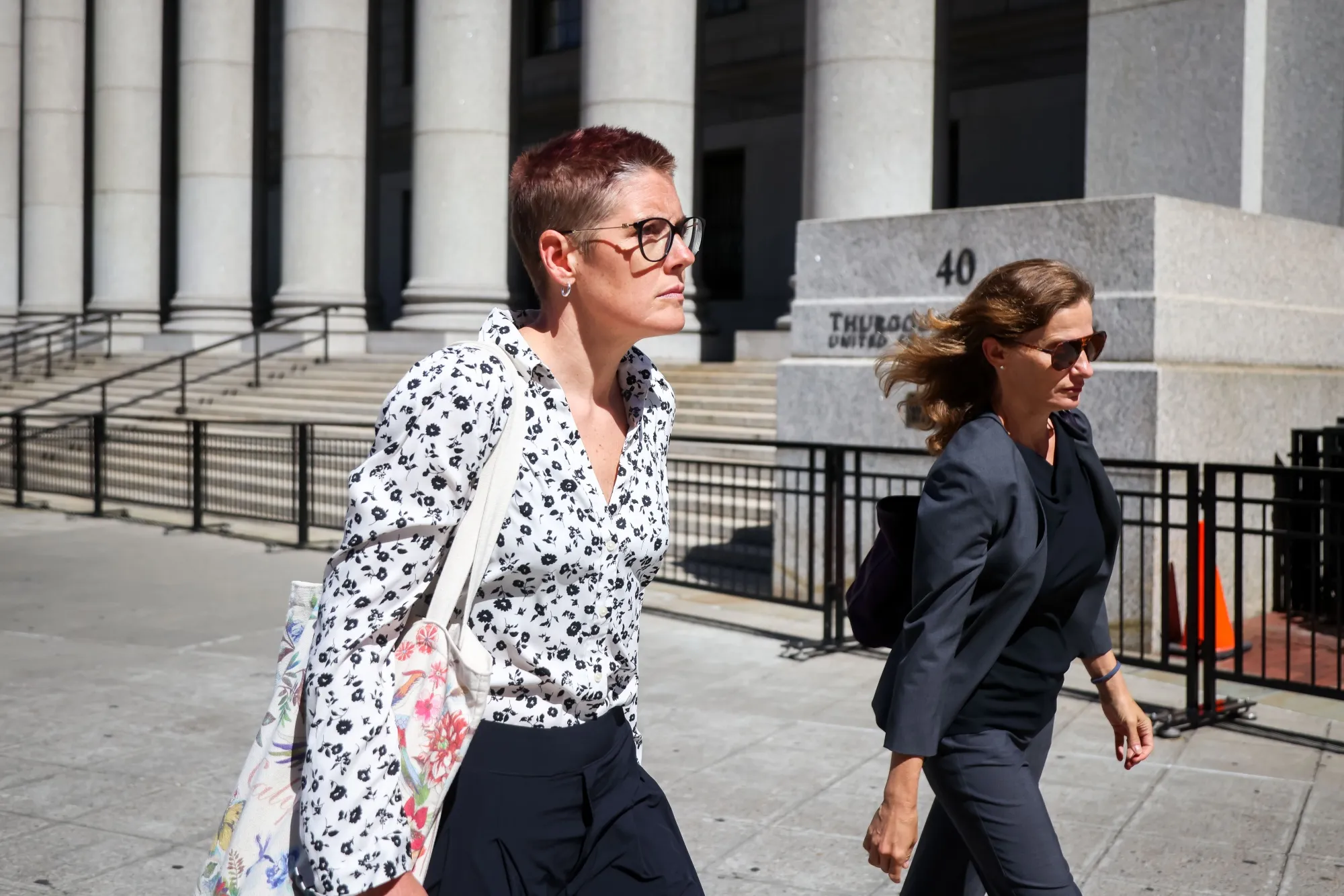 Christine Hunsicker, founder and former chief executive officer of CaaStle, left, leaves federal court in New York, US, on Friday, July 18, 2025.&nbsp;