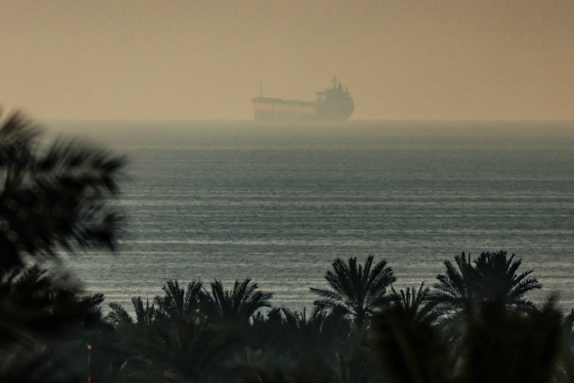 A tanker passes through the Strait of Hormuz in February.