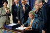 President George W. Bush signs the Pension Protection Act in 2006.