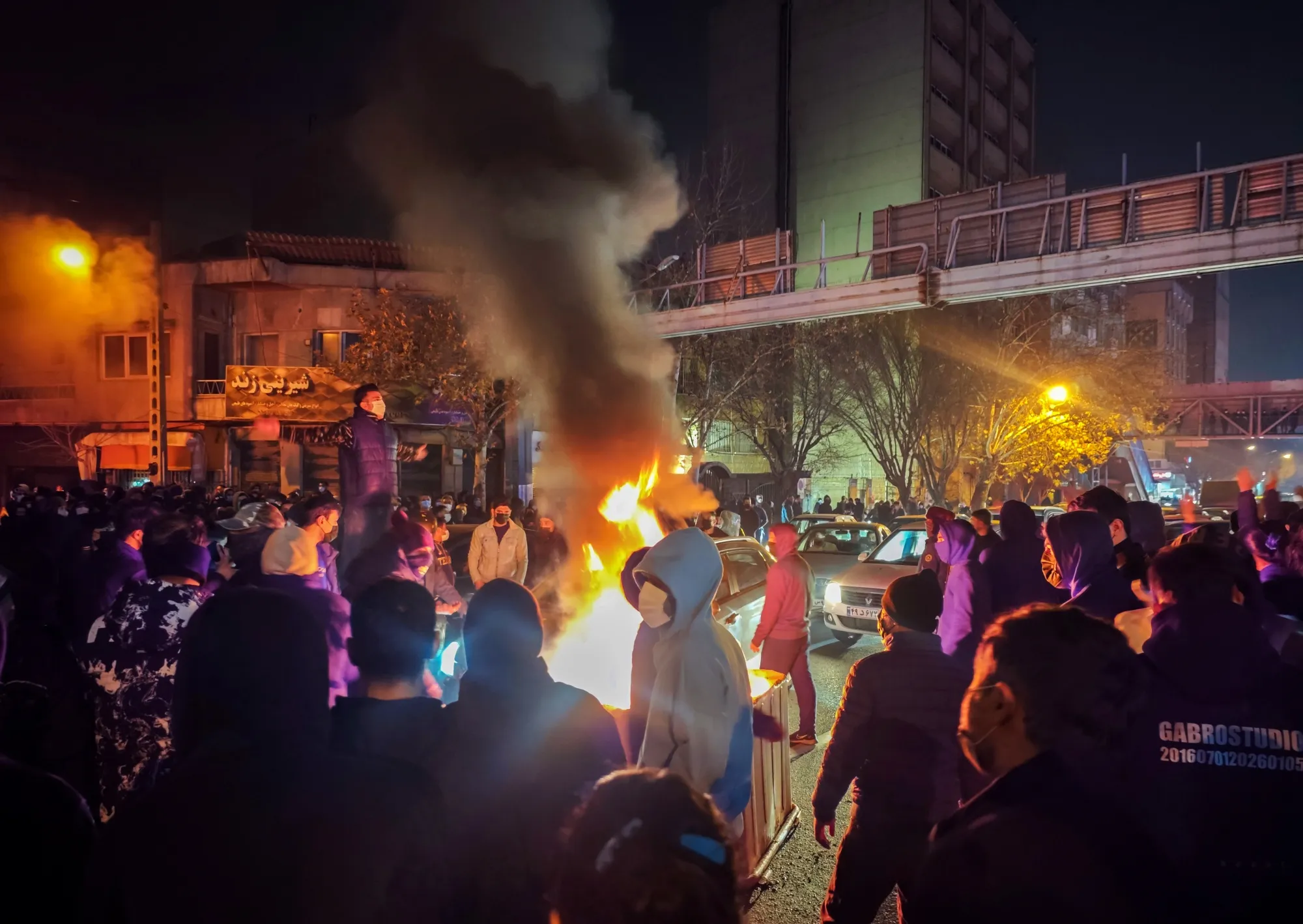 Fires are lit during a protest in Tehran on Jan. 8.