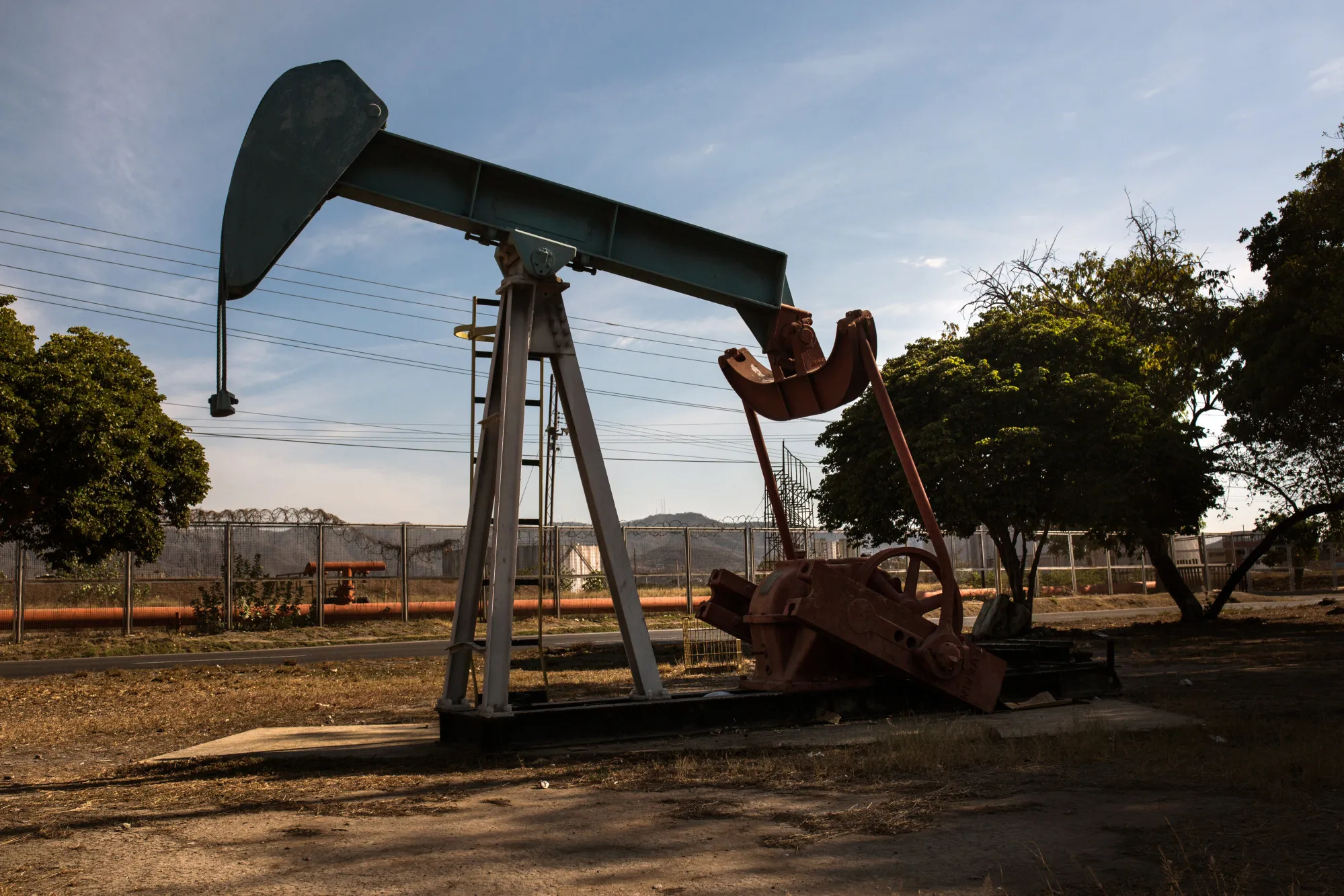 An oil pump jack stands in Puerto La Cruz, Anzoategui State, Venezuela, on Wednesday, Feb. 7, 2018.&nbsp;