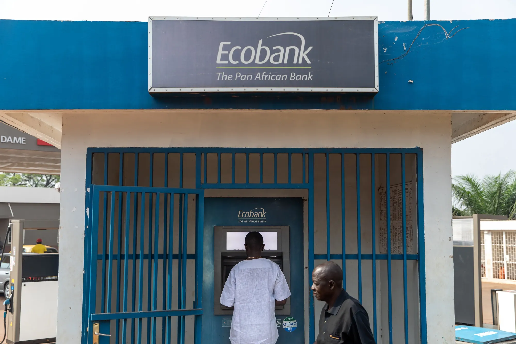 A customer uses an Ecobank Transnational automated teller machine.