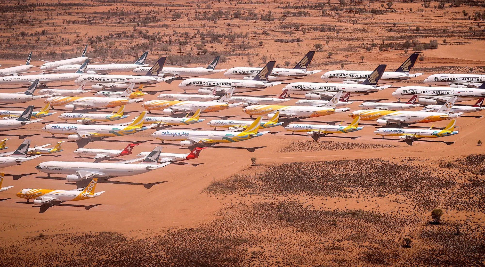 A fleet of aircraft parked in the desert at the Asia Pacific Aircraft Storage Facility in Alice Springs, Australia, has become an evocative symbol of the pandemic’s impact on the global aviation industry.