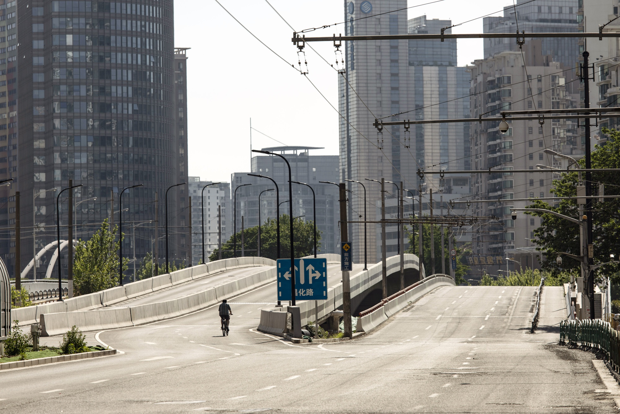 A nearly-empty road during a lockdown&nbsp;in Shanghai on May 5.