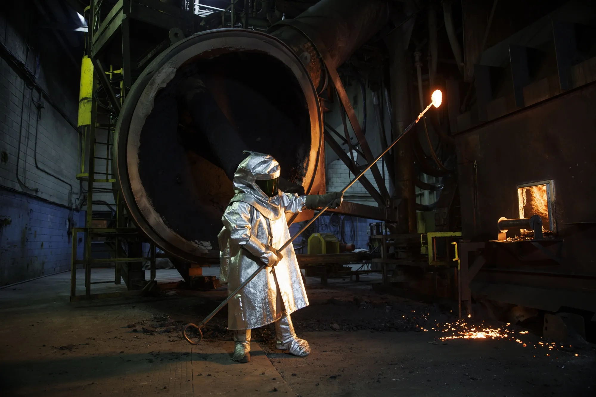 A worker takes a sample of molten nickel.&nbsp;Ontario, Canada’s most populous province, is rich in nickel, chromite and copper.