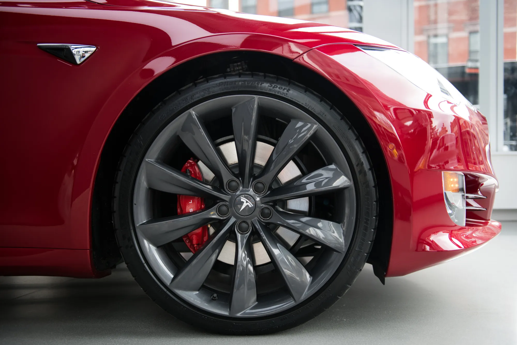A wheel on the Tesla Inc. Model S P100D sedan vehicle is seen at the company's new showroom in New York, U.S., on Thursday, Dec. 14, 2017.