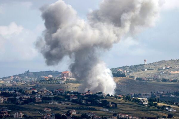 Smoke billowing above the Lebanese village of Mays al-Jabal during Israeli strikes, on May 5.