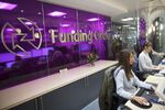 Employees work at the Funding Circle Ltd. office headquarters, in London.