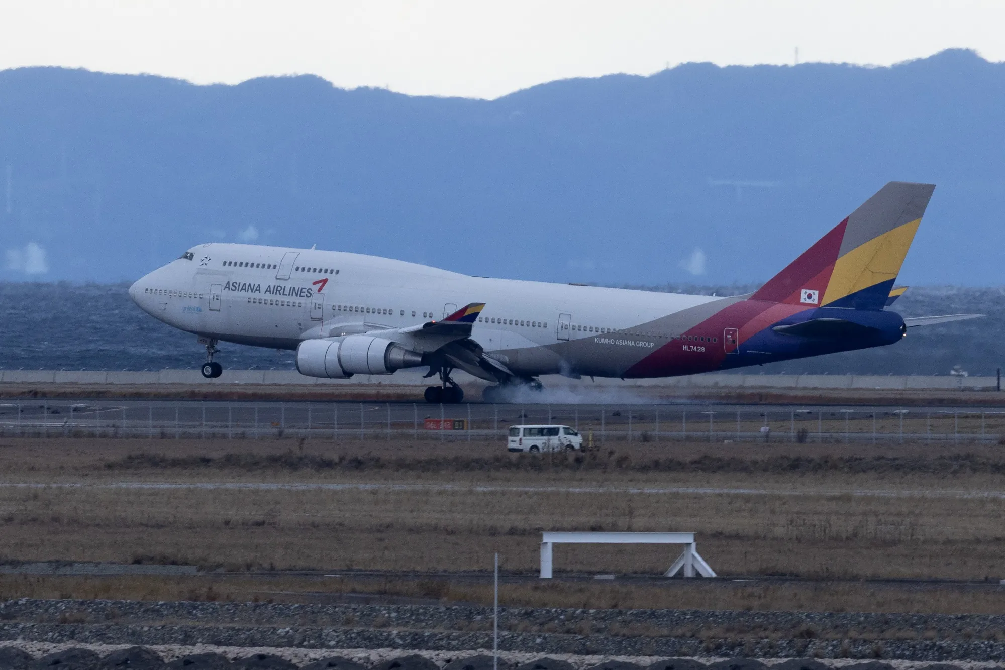 An Asiana Airlines Inc. passenger aircraft lands at Kansai International Airport in Izumisano, Osaka Prefecture, Japan.