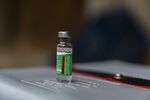 A vial of the Covishield Covid-19 vaccine on a cold box during a 'door-to-door' vaccination drive at a village in the Budgam district of Jammu and Kashmir, India.