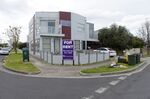 A 'For Rent' sign stands outside a property in the suburb of Brooklyn in Melbourne, on Aug. 12.