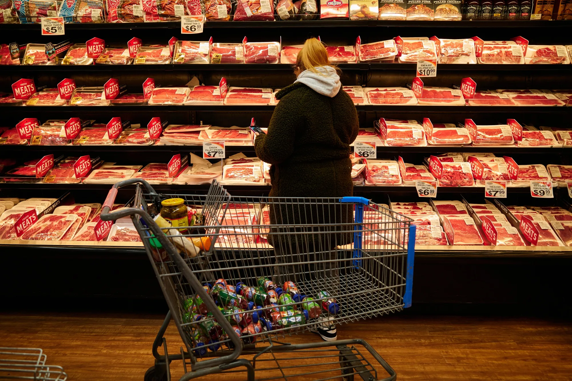 A shopper browses different cuts of beef at a supermarket in&nbsp;New York.