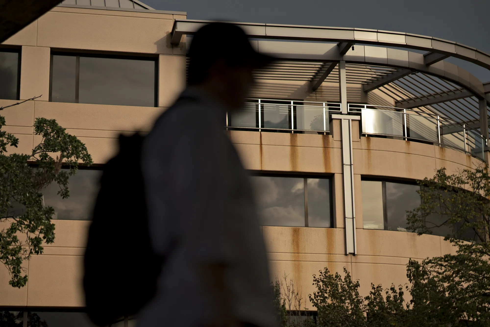 A pedestrian walks past the Democratic National Committee (DNC) headquarters in Washington.