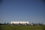 American Airlines Group Inc. Boeing Co. 737 Max planes sit parked outside of a maintenance hangar at Tulsa International Airport (TUL) in Tulsa, Oklahoma.