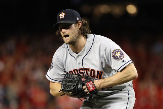 Yankees Sign Pitcher Gerrit Cole to Record $324 Million Deal, AP Says