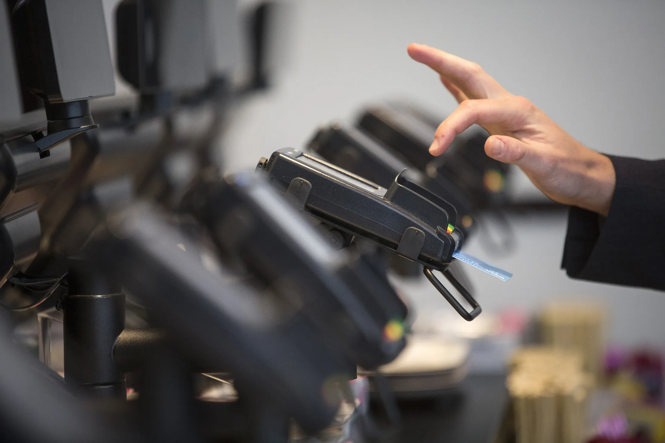 A customer enters their pin number as they make a chip and pin payment via a credit card payment device at a restaurant on Friday, May 22, 2015.&nbsp;