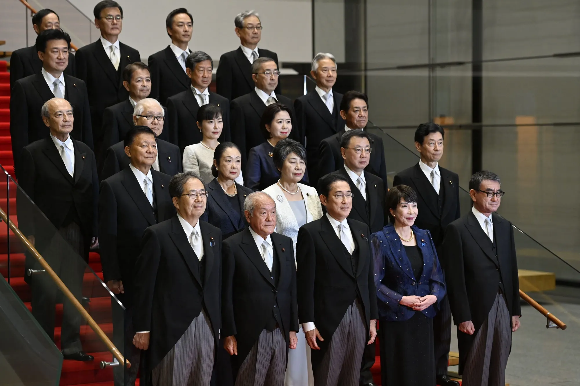 Fumio Kishida with his new cabinet in Tokyo on Sept. 13.