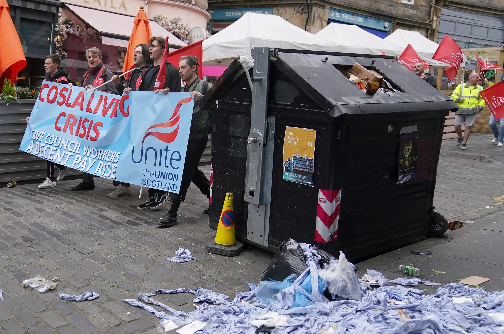 Municipal refuse collectors during strike action in Edinburgh, on Aug. 18.
