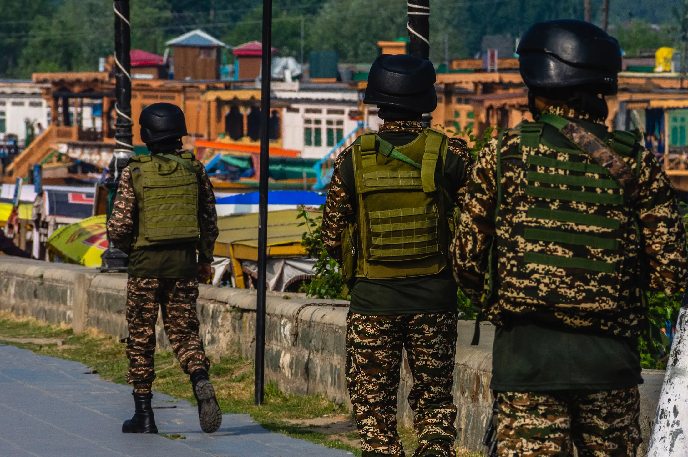 Indian paramilitary soldiers patrol Dal lake in Srinagar, India, on May 11, 2025.