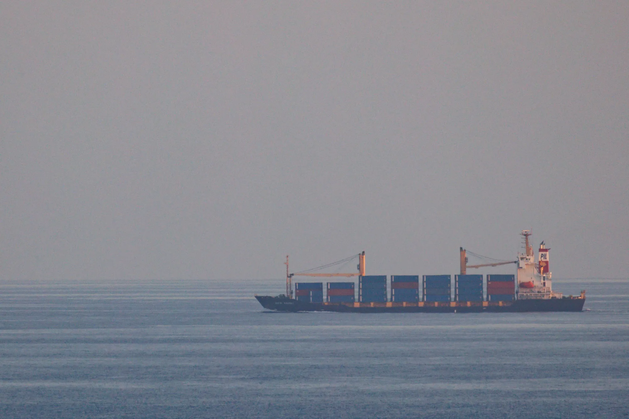 The container ship pproaches the Bab-el-Mandeb strait.